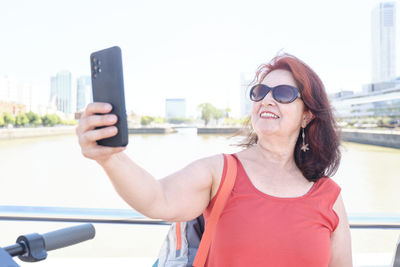 Young woman using mobile phone