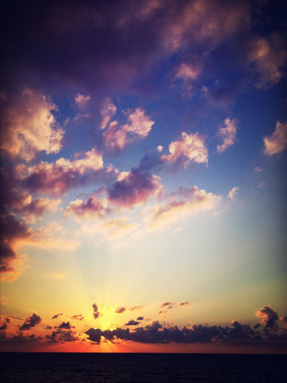 sunset, scenics, tranquil scene, tranquility, beauty in nature, sky, nature, sea, idyllic, orange color, water, horizon over water, cloud - sky, cloud, outdoors, silhouette, no people, majestic, cloudy, remote