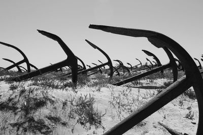 Close-up of metal structure against sky