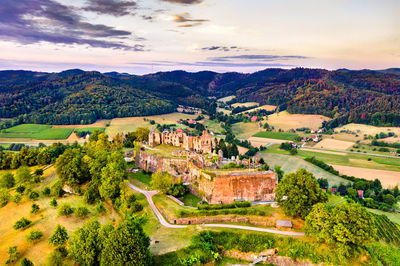 High angle view of town against cloudy sky