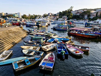 Boats moored at harbor