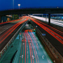 High angle view of light trails on road