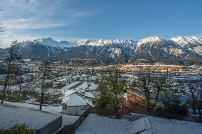 Aerial view of townscape against sky