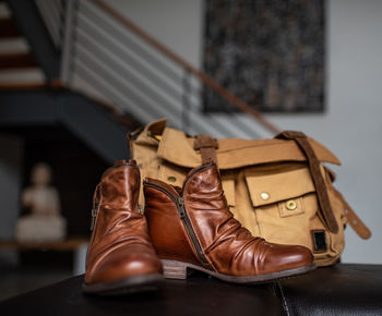 Close-up of shoes on table