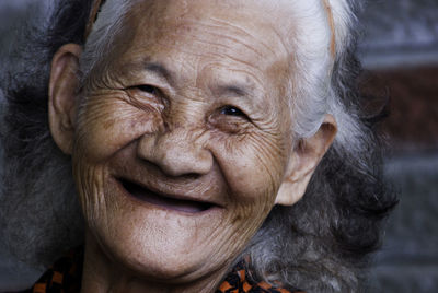 Close-up portrait of happy senior woman
