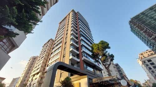 Low angle view of skyscraper against sky