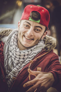 Portrait of smiling man wearing hat