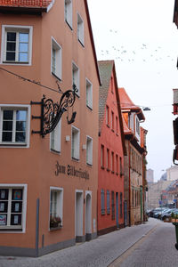 Residential buildings by street in city