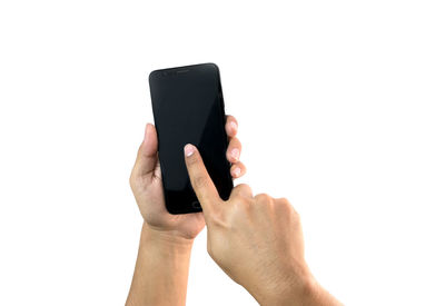 Close-up of man using mobile phone against white background