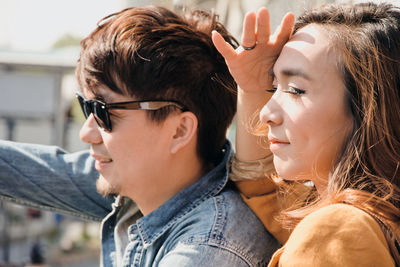 Mature couple in city on sunny day