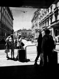 People walking on street in city