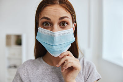 Young woman wearing mask