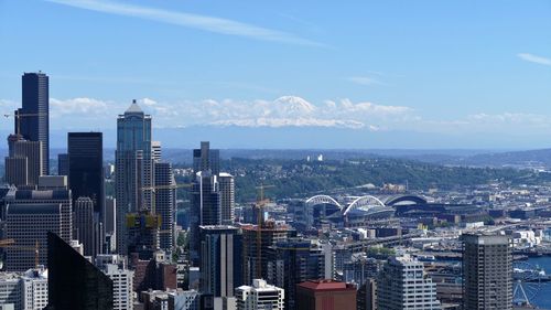 City skyline against blue sky