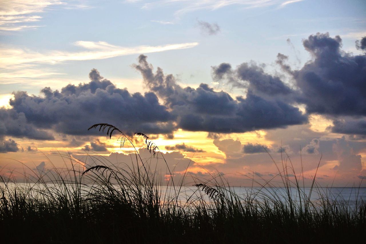 SCENIC VIEW OF SILHOUETTE LAND AGAINST SKY DURING SUNSET