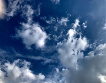 Low angle view of clouds in blue sky