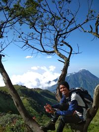 Full length of man on mountain against sky