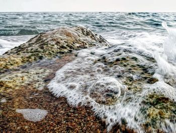 Close-up of wave on beach