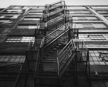 Low angle view of staircase on building against sky