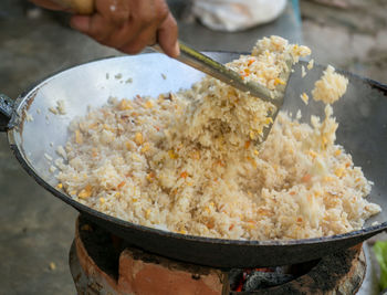 Cropped image of man preparing food