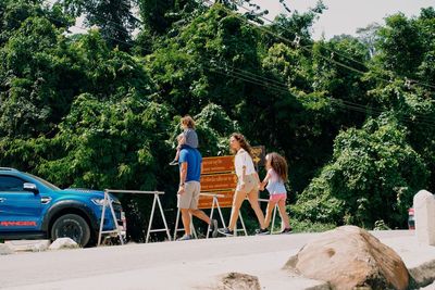 Group of people against the trees