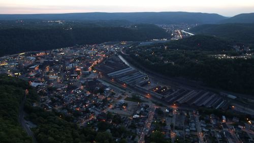 High angle view of illuminated buildings in city