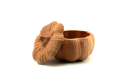 Close-up of bread against white background