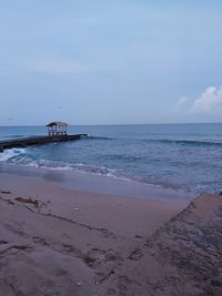 Scenic view of beach against sky