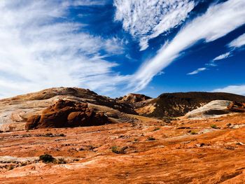 Scenic view of mountain against blue sky