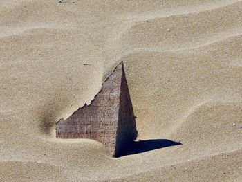 High angle view of shadow on sand