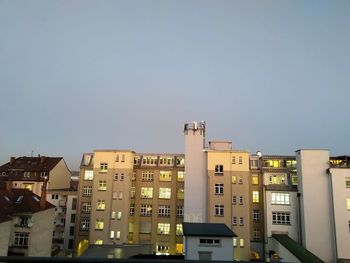 Low angle view of buildings against clear sky