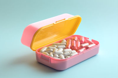 Close-up of pills against white background