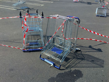 High angle view of shopping cart on street