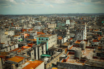 Aerial view of cityscape against sky