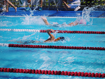 People swimming in pool