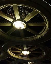 Low angle view of illuminated ceiling