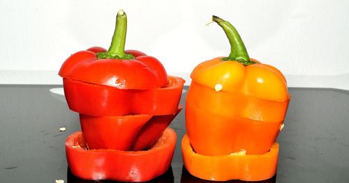 Close-up of orange bell peppers on table