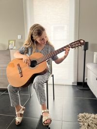 Girl with her guitar