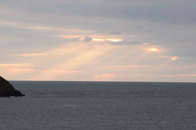 Scenic view of sea at sunset