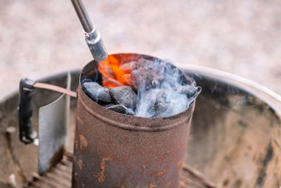 Close-up of fire on barbecue grill