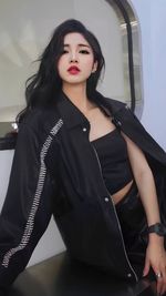 Portrait of young woman looking away