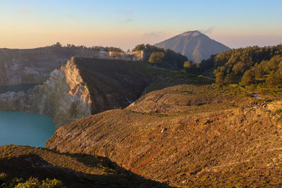 Scenic view of landscape against sky during sunset