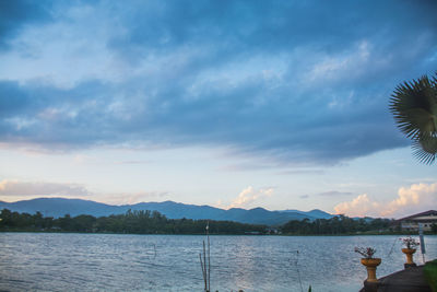 Scenic view of lake against sky during sunset