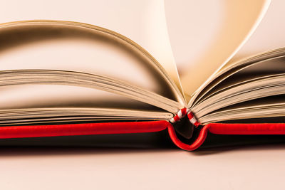 Close-up of heart shape on book