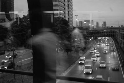 Blurred motion of vehicles on road in city