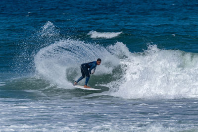 Man surfing in sea