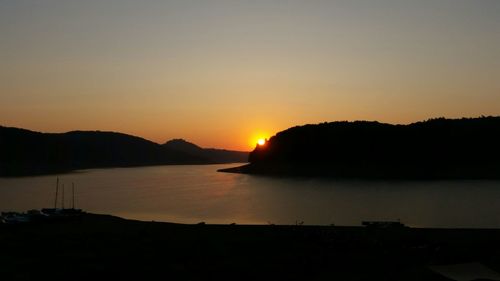 Scenic view of sunset over mountains