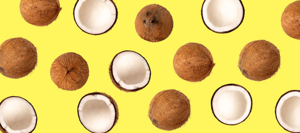 Directly above shot of multi colored candies against white background