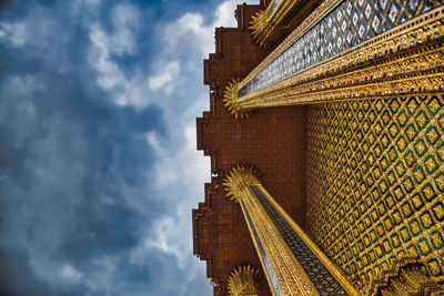 Low angle view of illuminated buildings against sky