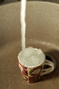 Close-up of coffee cup on table