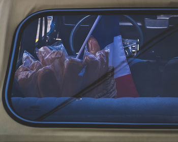 Bread in car seen through windshield